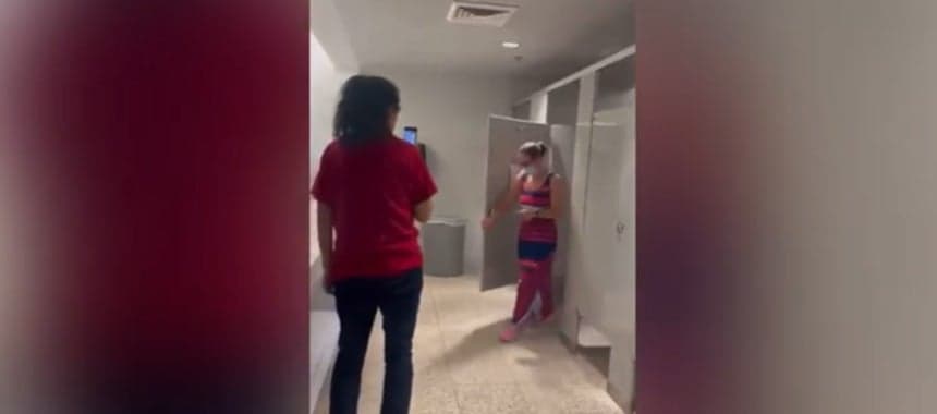 Cover Image for Biden Shrugs Off Activists Chasing Sinema Into Bathroom